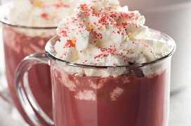 Crockpot Red Velvet Hot Chocolate - This indulgent, rich and creamy hot chocolate is made easy in the crockpot!  Red velvet hot chocolate is the perfect treat to warm you up this holiday season!