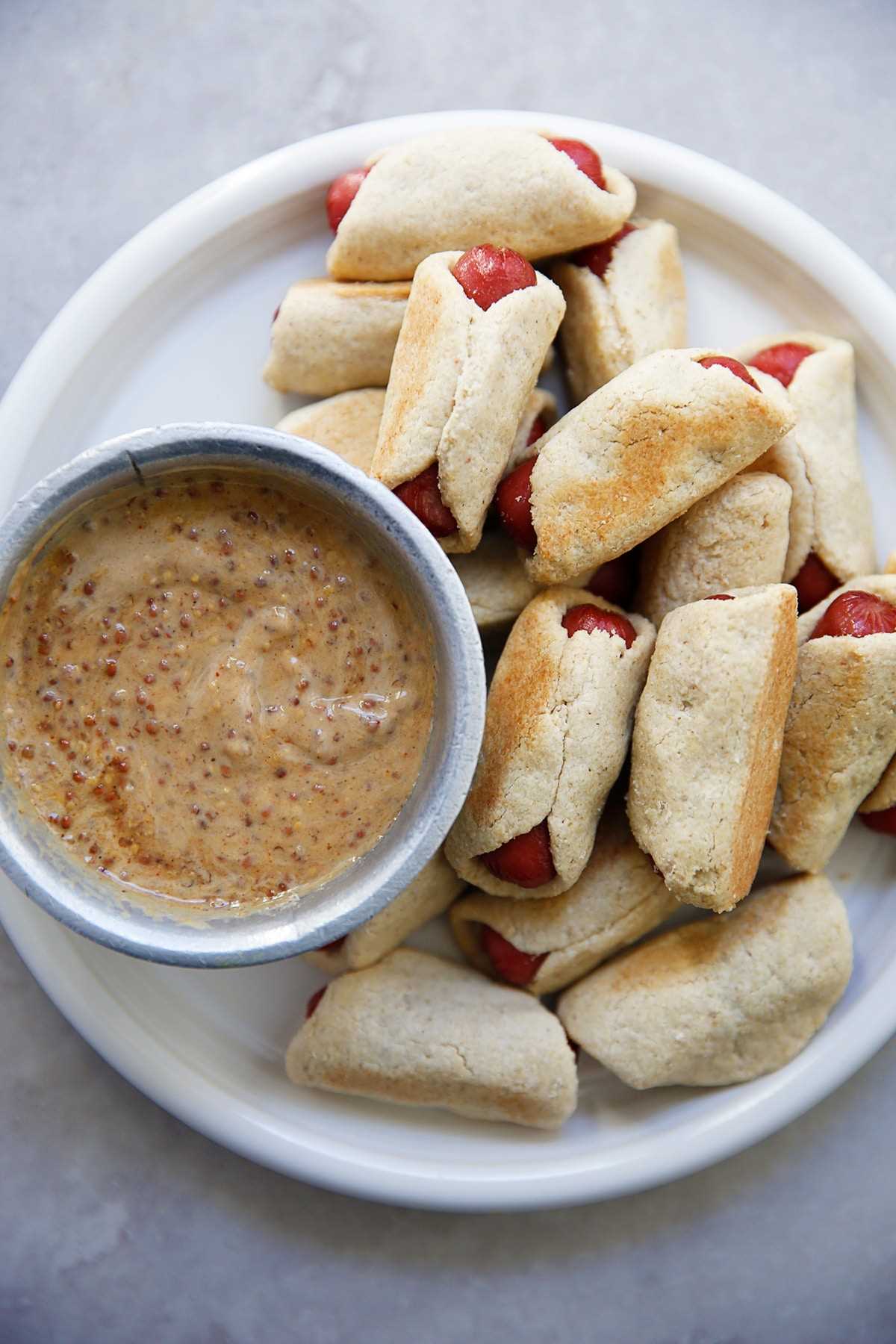 Gluten free pigs in a blanket with mustard