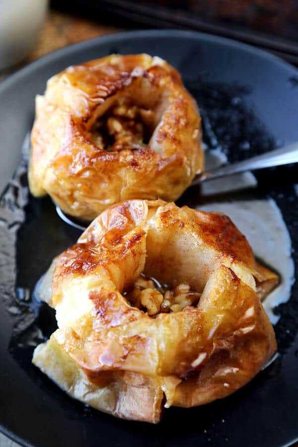 These sweet and tart baked apples with walnuts and cider will change the way you see healthy desserts! And prepping only takes five minutes!
