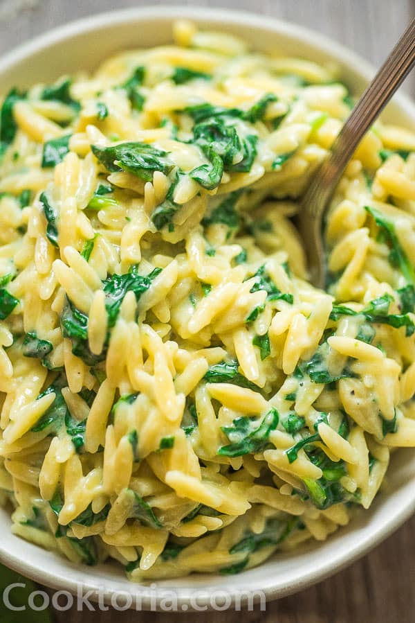 This Creamy Spinach Orzo makes a perfect side dish or even a full meal. It’s cheesy, creamy, and kids are crazy about it. Ready in 15 minutes!