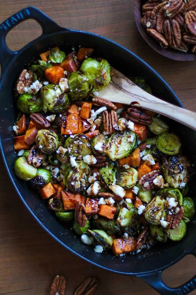 Roasted Brussels Sprouts and Sweet Potatoes with Pecans, Feta, and Balsamic Reduction