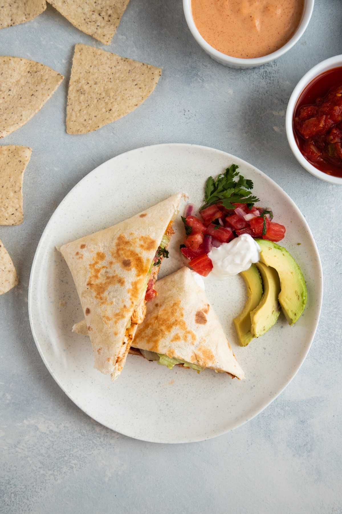 Chipotle Chicken Wrap served with pico de gallo, avocado and sour cream on the side