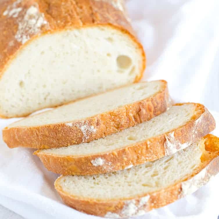 This Italian bread recipe takes some time to come together, but the hard crust and chewy bread are 100% worth it. Totally necessary with a bowl of pasta or a hearty soup!