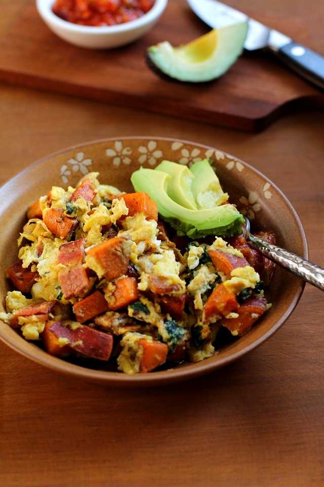 Breakfast scramble with sweet potatoes, bacon, and spinach