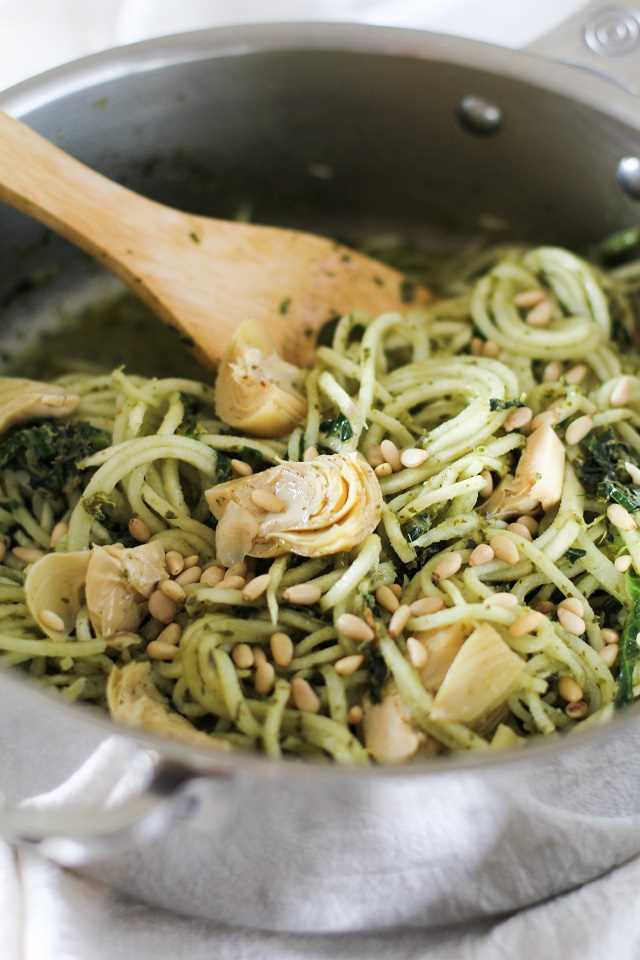 Turnip Pesto Pasta with Artichoke Hearts, Kale, and Pine Nuts - spiralize turnips for a comforting yet healthy meal!