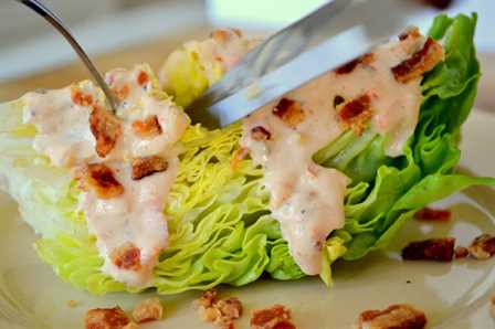 a wedge of lettuce with homemade Thousand Island dressing
