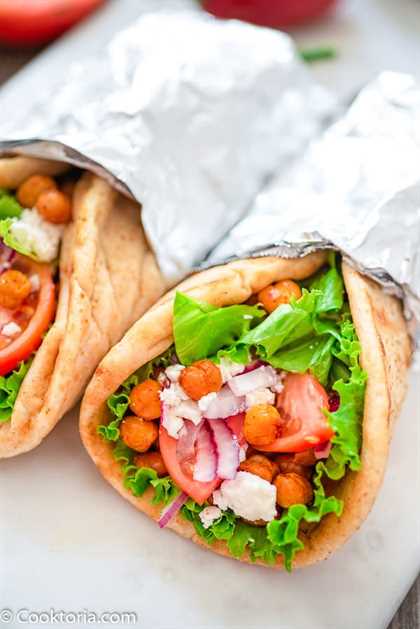 Vegetarian Gyro with lettuce, tomatoes, and chickpeas