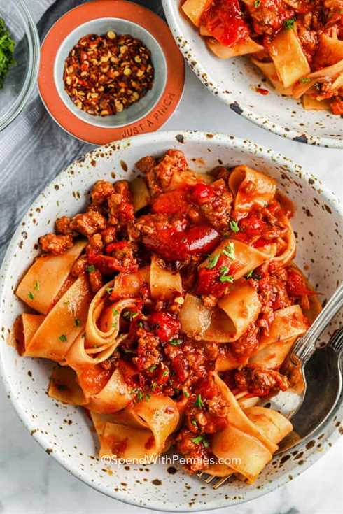 pappardelle in a bowl with tomato sauce