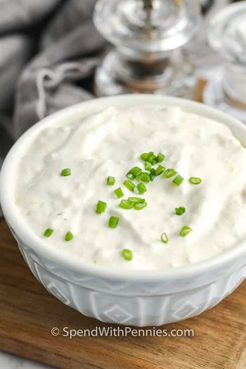 Horseradish Sauce in a white bowl with garnish