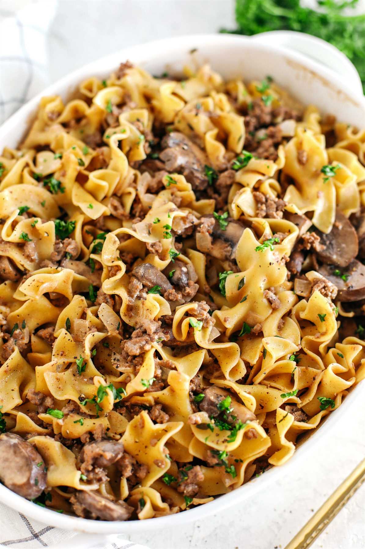 This Easy Beef Stroganoff Casserole is the ultimate family-friendly comfort food! The perfect weeknight meal made with egg noodles and smothered in the most delicious creamy mushroom sauce in just 30 minutes!