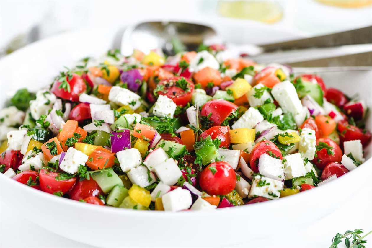 Israeli salad in a white bowl