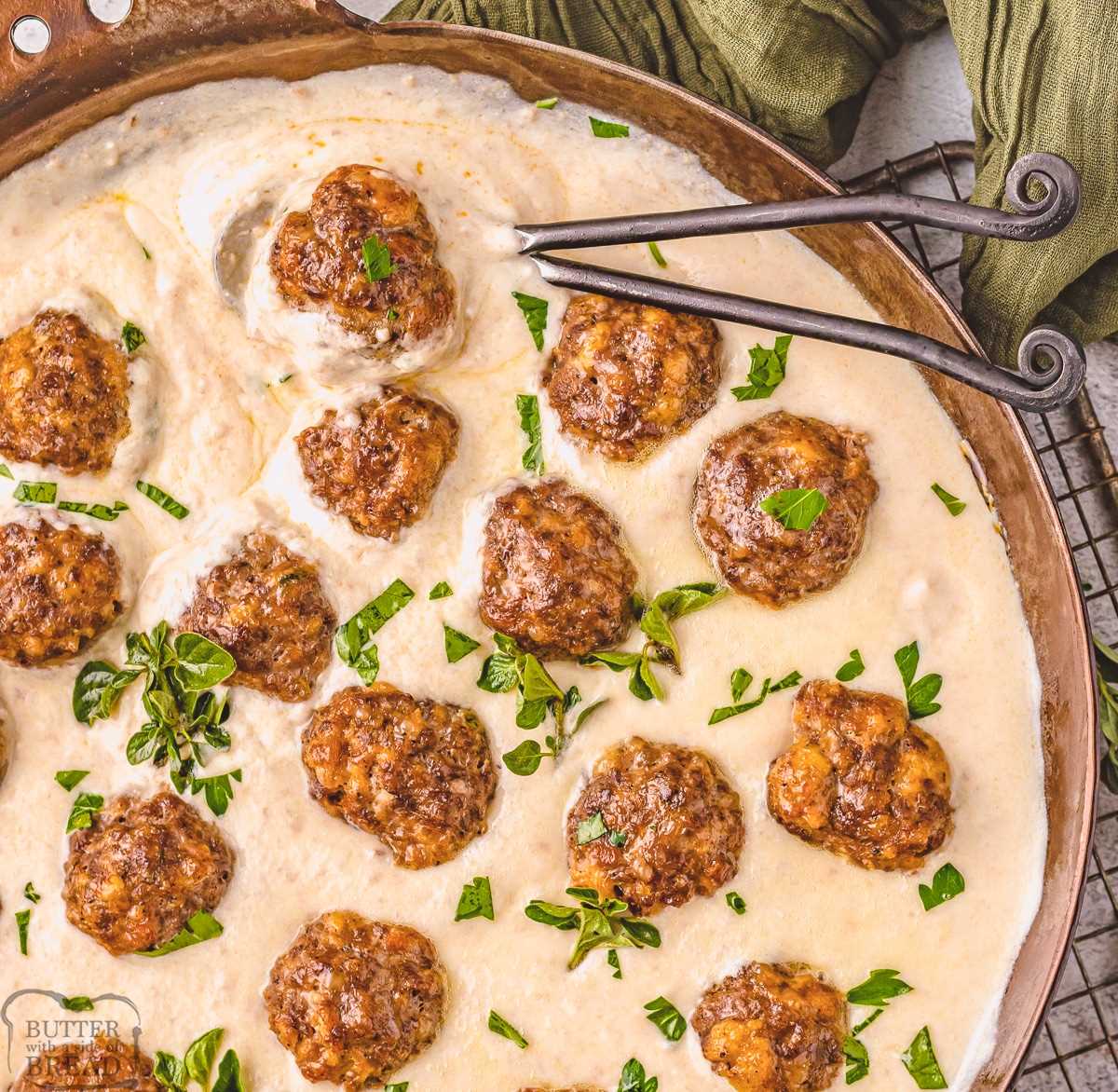meatballs and gravy in a cast iron skillet