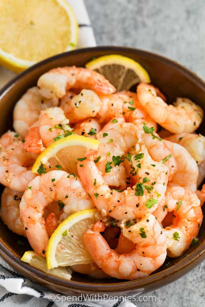 Sauteed Shrimp in a bowl with lemon and parsley