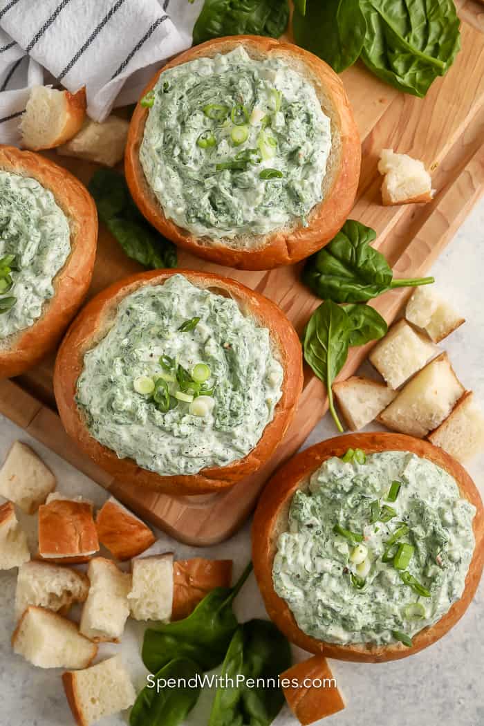 top view of spinach dip a bread bowls