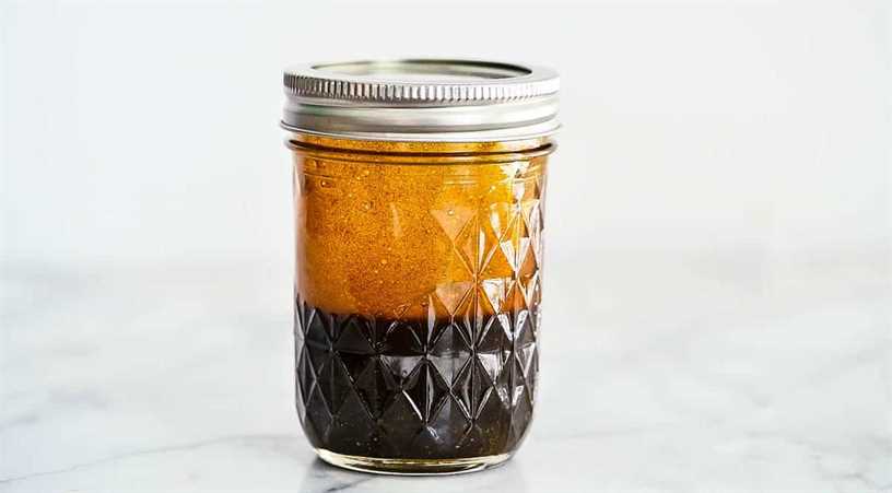Finished balsamic vinaigrette in mason jar with lid on.