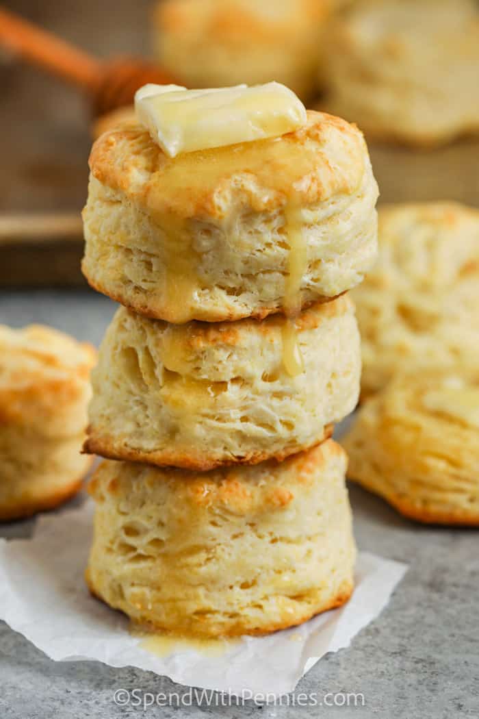 Easy Homemade Buttermilk Biscuits in a stack with butter melted on top