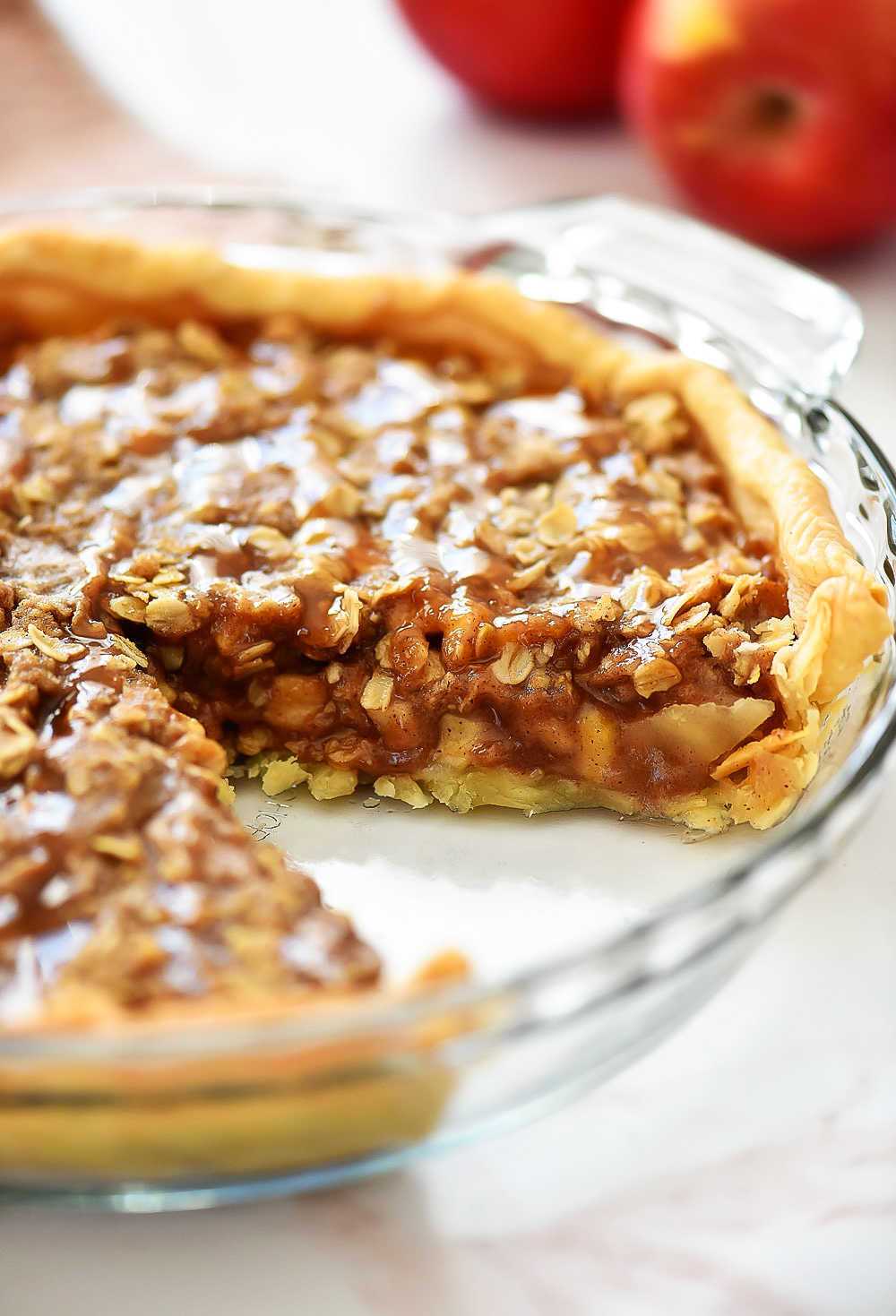 Deep Dish Apple Crisp is a thick layer of apples, cinnamon and sugary oats baked over a flaky pie crust. Life-in-the-Lofthouse.com