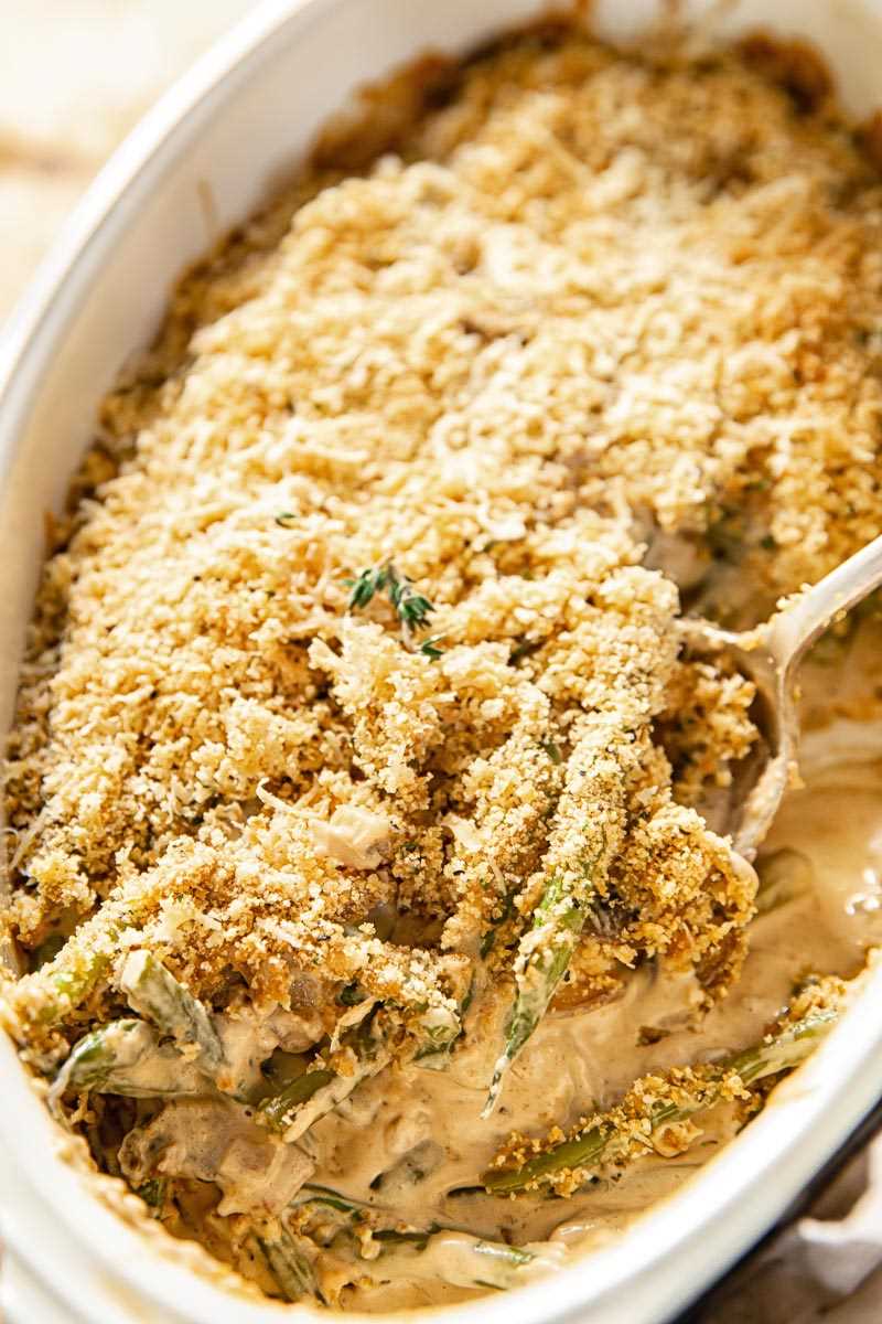 Green Bean Casserole covered with Parmesan breadcrumbs
