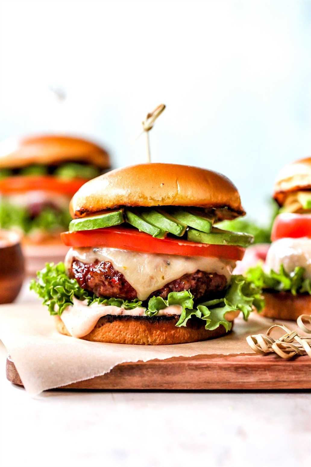 Chipotle Burgers with cheese, avocado, tomato, and lettuce